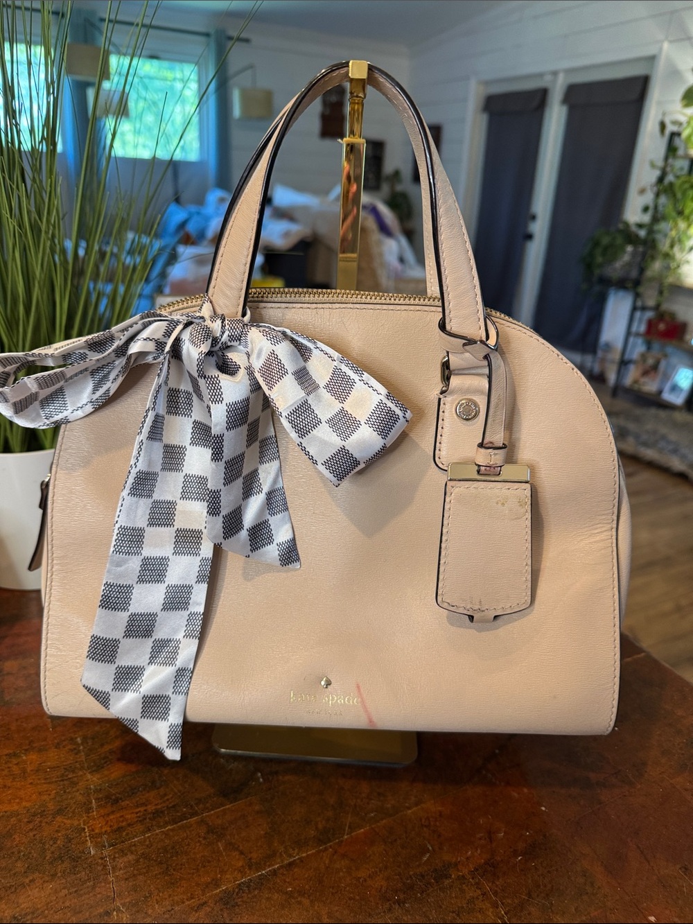 kate spade pale blush dome satchel with black-and-white check scarf